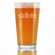 Slainte - Irish Cheers - Pint Glass for Beer - Funny St Patricks Day Party Decor or Gifts for Men & Women - 16 oz Cup